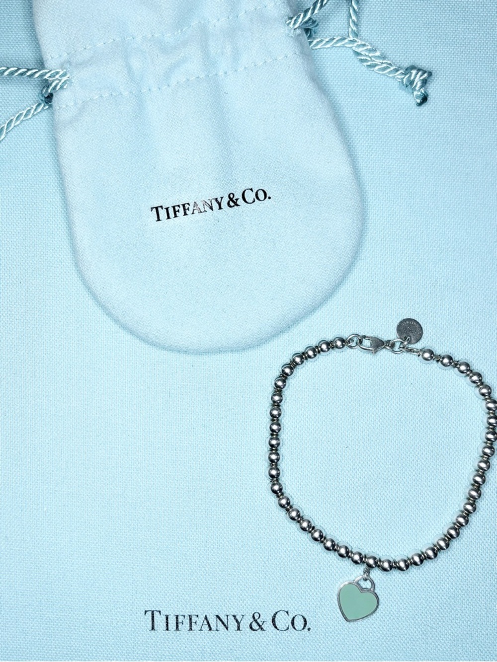Authentic Tiffany & Co. 4mm Bead Bracelet with Mini Blue Heart Charm